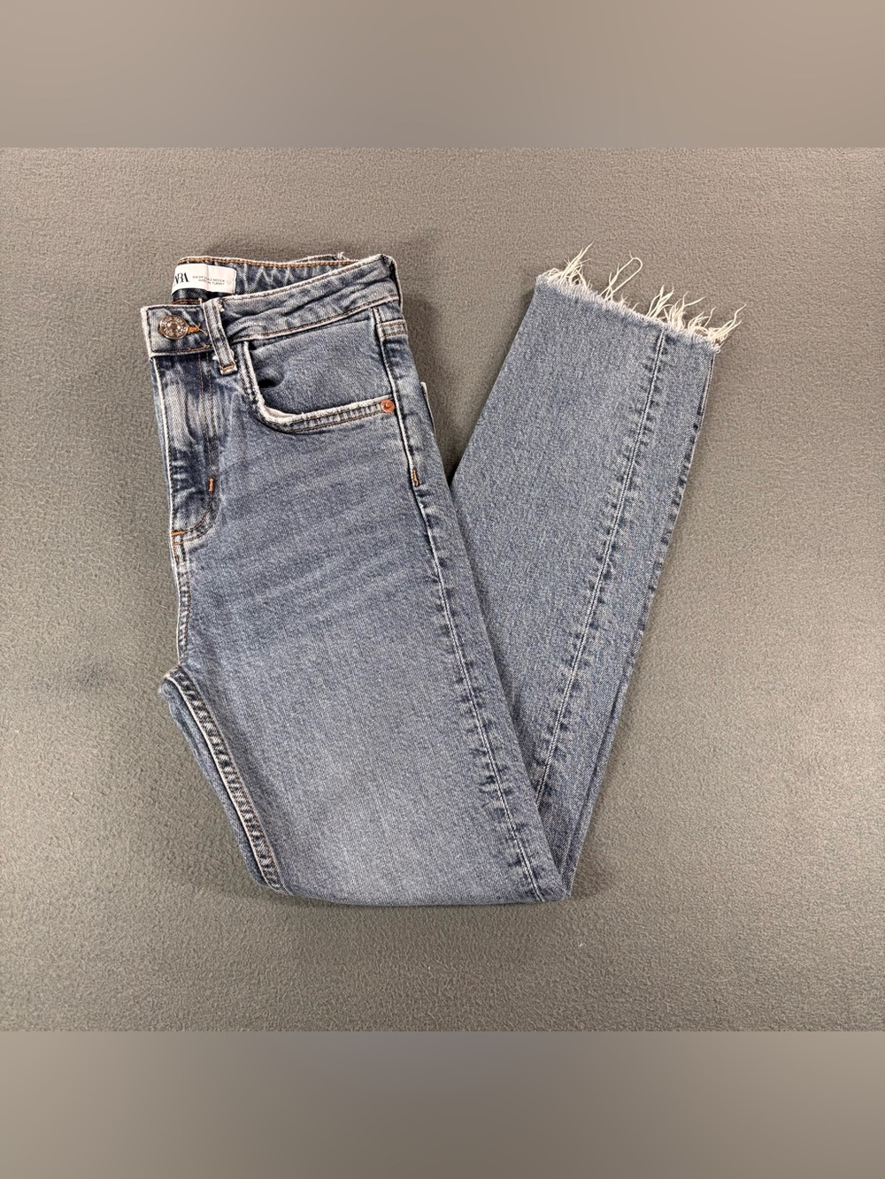 Zara blue denim jeans with frayed hem, size 2